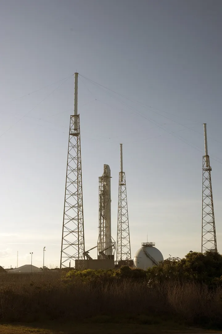 Falcon rocket stands ready for lifts off its ninth commercial resupply mission (28355465056)