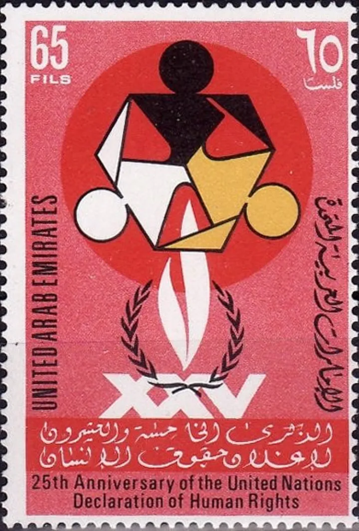 Stamp of United Arab Emirates - 1973 - Colnect 505241 - Emblem of the year of for human rights different breeds.jpeg