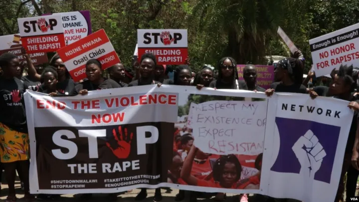 Protesters in Blantyre, Malawi, 16 Nov.2020, against increased cases of sexual abuse. Women's lawyers were accused of double-dipping when women in a rape cas