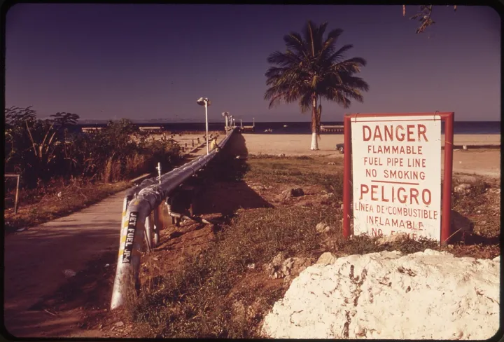 OIL PIPELINE ON THE BEACH - NARA - 546402