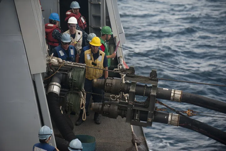 US Navy 120104-N-PB383-513 A double-probe fuel line approaches a refueling station