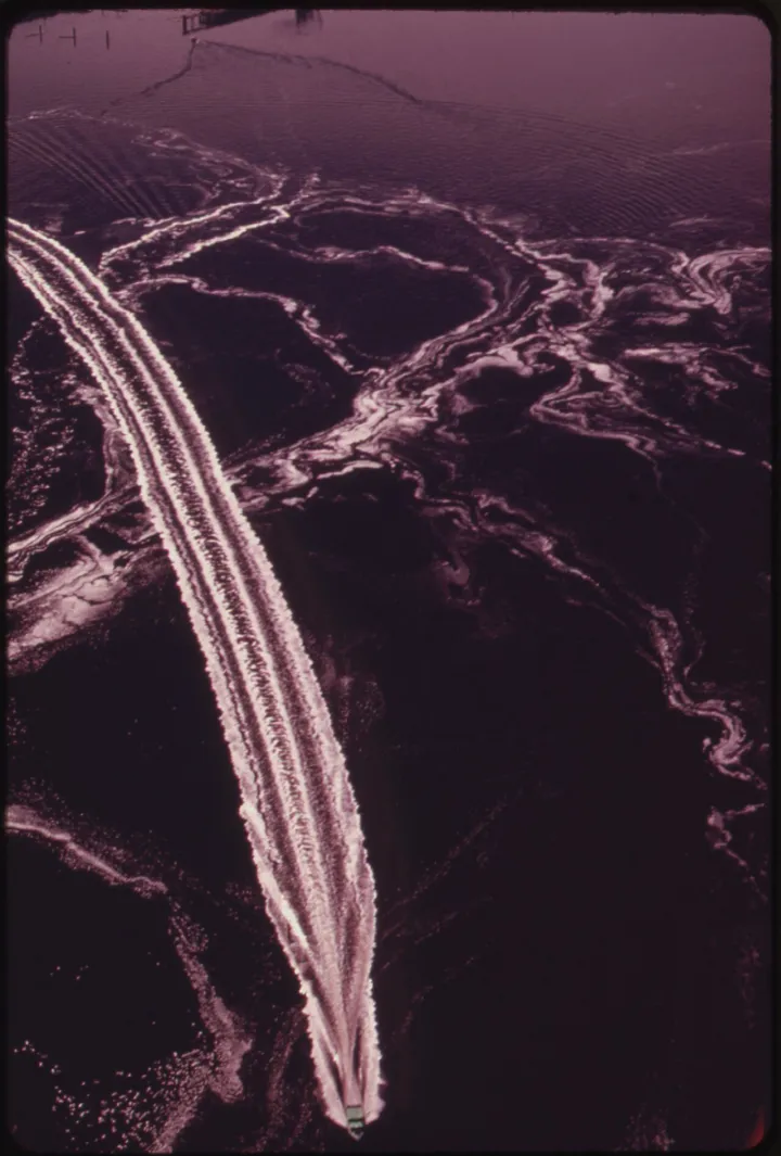MOTOR BOATS STIR UP FOAMY PULP WASTE - NARA - 552166.tif