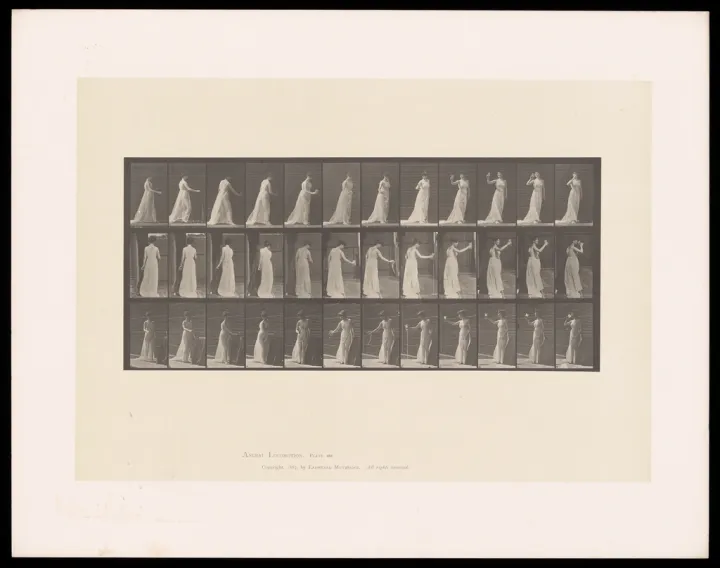 clothed woman pours liquid glass