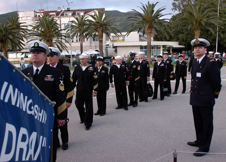 US Navy 070519-N-2566U-017 Sailors from the USS Emory S. Land prepare to board the Montenegrin navy's training vessel, Jadran, for an evening reception