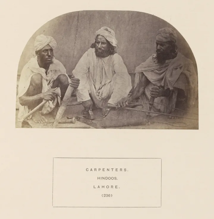 Portrait of three unidentified Lahore carpenters (likely Tarkhan) with tools, ca.1862–72