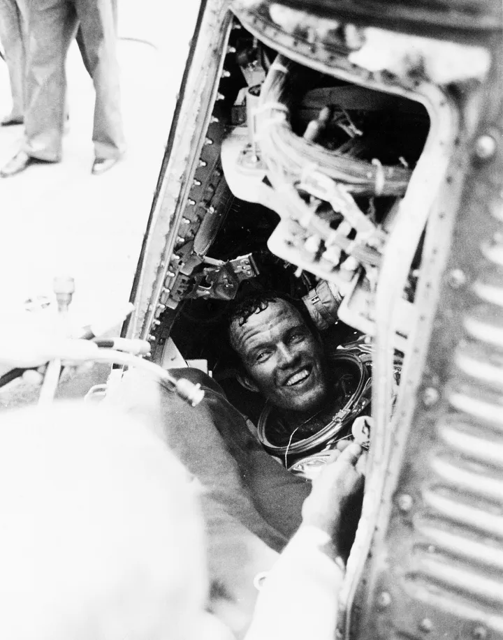 Recovery- Cooper smiles at recovery crew on Kearsarge (s63-07852)