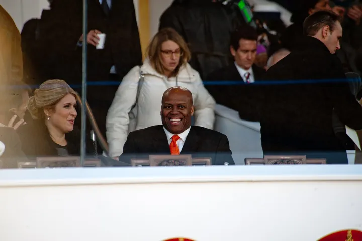 First lady's brother waits for Obama family's arrival 130121-Z-QU230-174