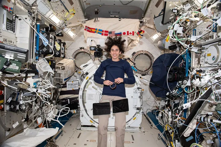Iss070e035105 (Nov 30, 2023) --- NASA astronaut and Expedition 70 Flight Engineer Jasmin Moghbeli takes a break during operations and poses for a portrait insid
