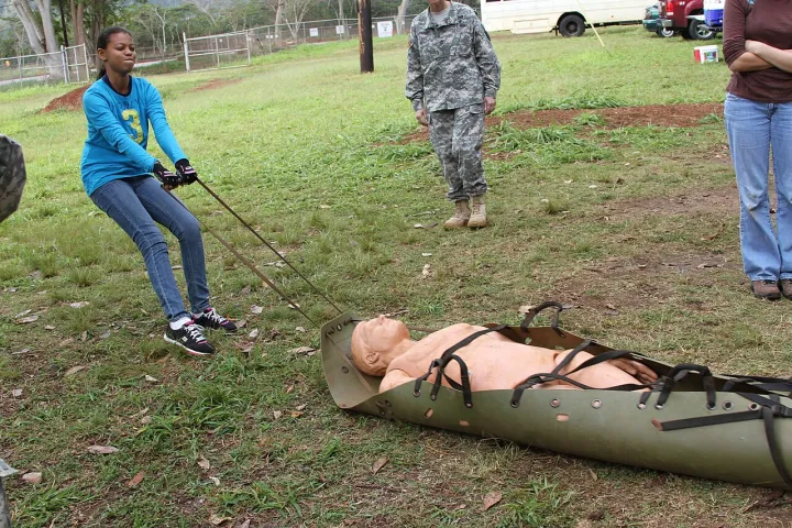 Mamiana Moore, Moanalua High School, experiences how difficult it can be to move an injured patient