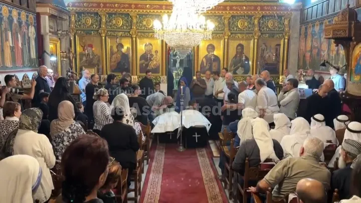 Funeral held in Gaza City for 2 Christian women killed by an Israel strike