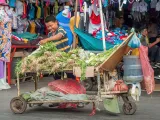 Child working selling vegetables in downtown Maracaibo