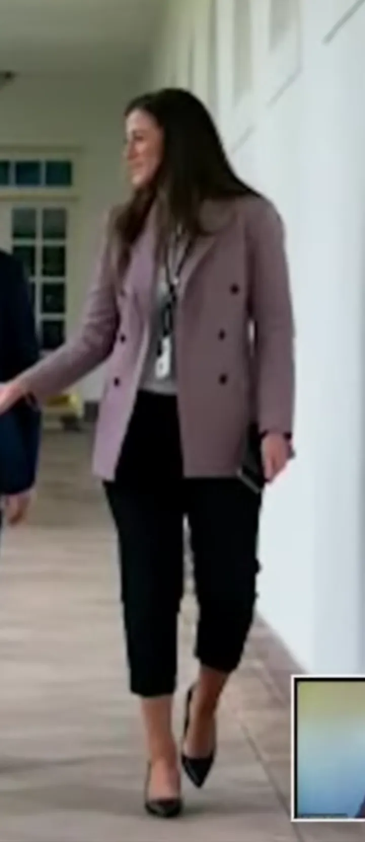 Cassidy Hutchinson walking on the White House grounds