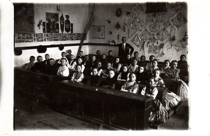 Teacher with his students, 1929