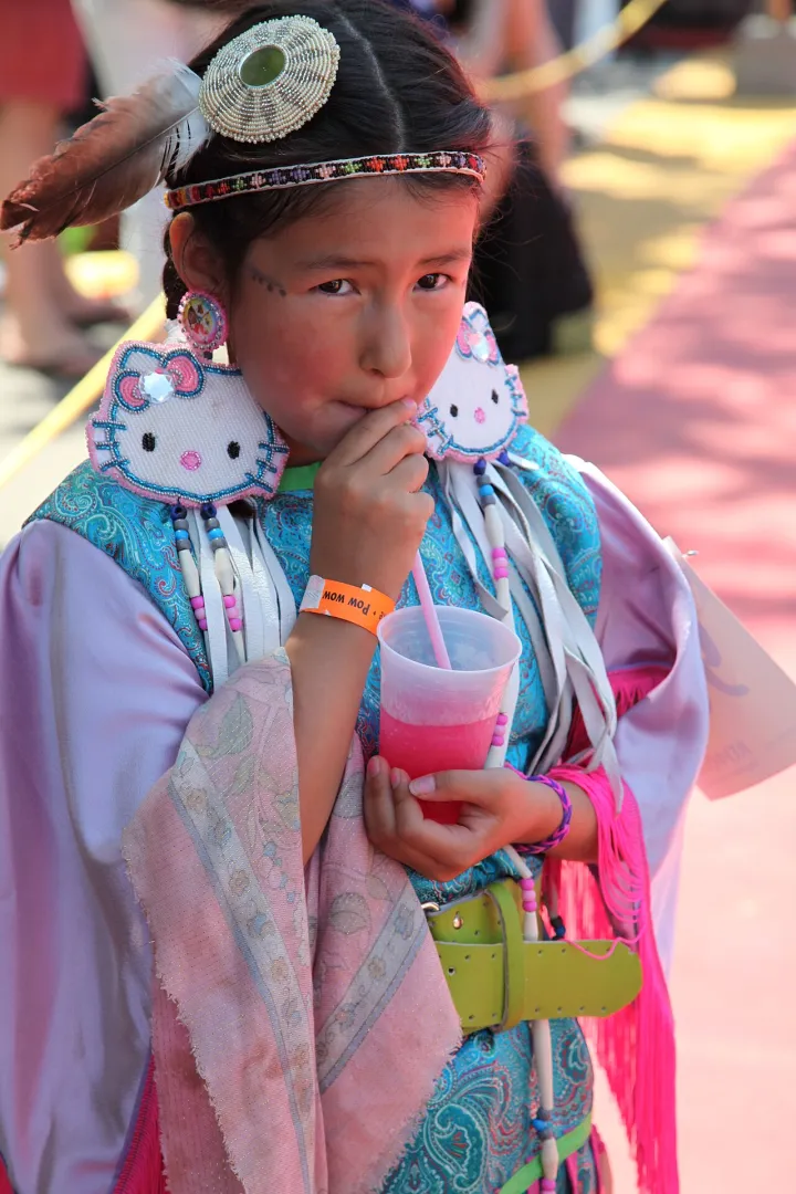 Canadian First Nations girl, costume with integrated Hello Kitty earrings